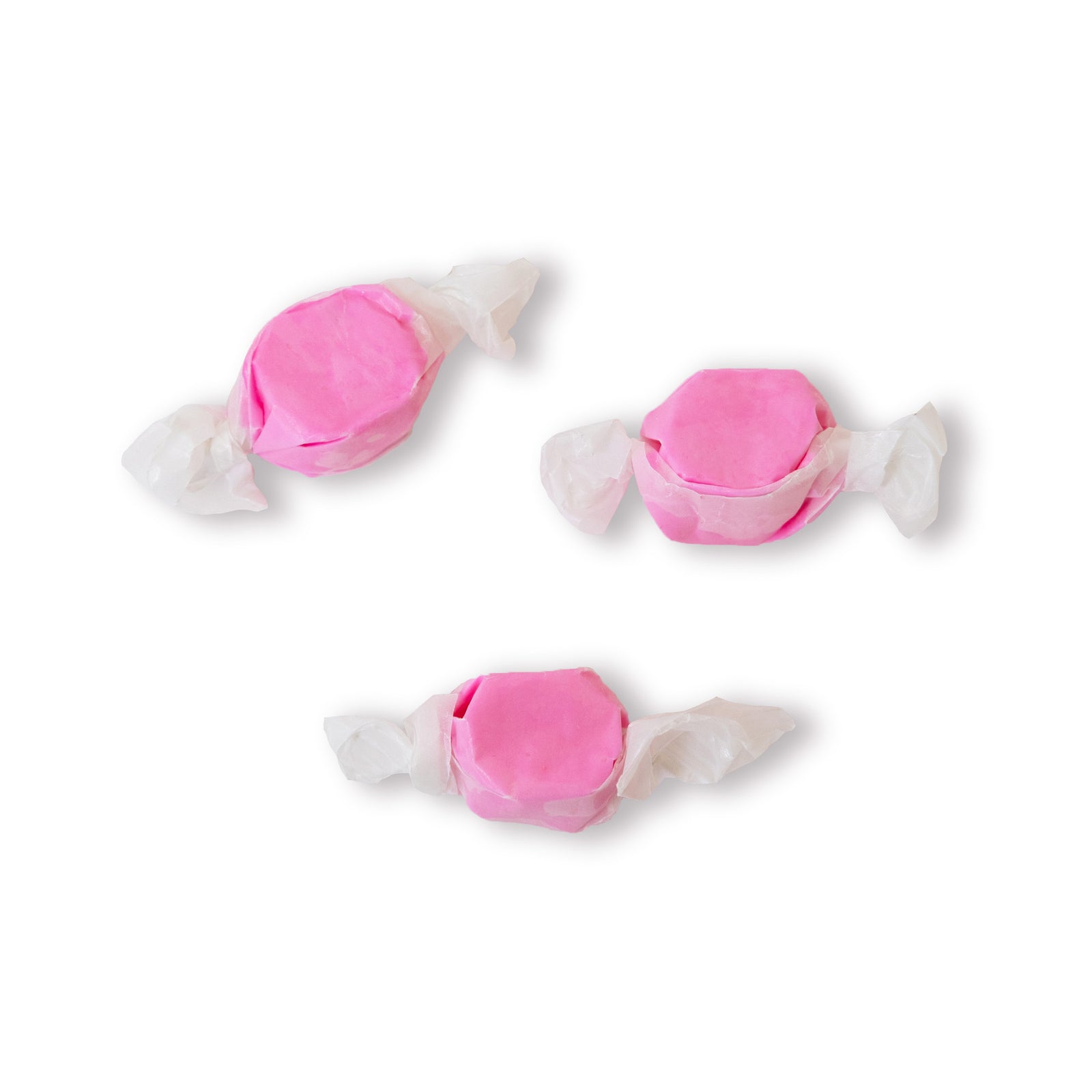 Three pieces of Bubbgle Gum Taffy on a white background